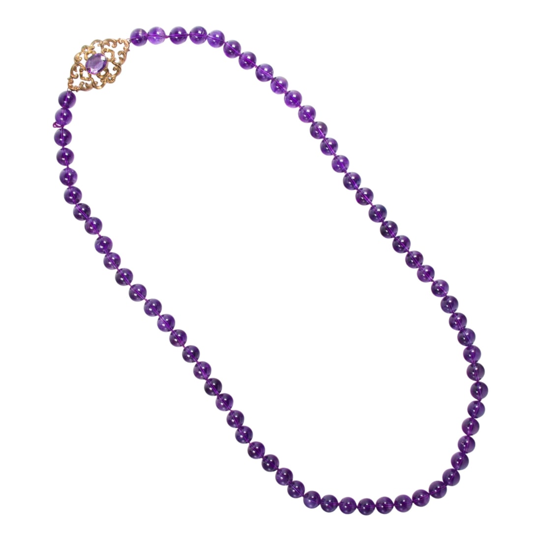 An amethyst and gold filled necklace: An amethyst and gold filled necklace designed as a strand of round amethyst beads with ornate clasp; length: 34 in; 170.00 grams