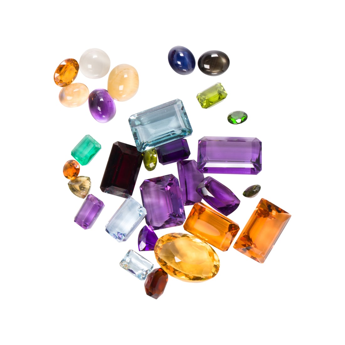 A collection of unmounted gemstones: A collection of unmounted gemstones Comprising an assortment of gemstones of varying cuts and sizes including, but not limited to, amethyst, aquamarine, and sapphire