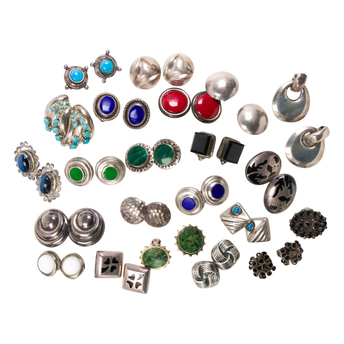 A large group of silver earrings: A large group of silver earrings Comprising 21 pairs of earrings, set with coral, jade, turquoise, onyx synthetic tigers eye, malachite, etc. ; 502.00 gross grams