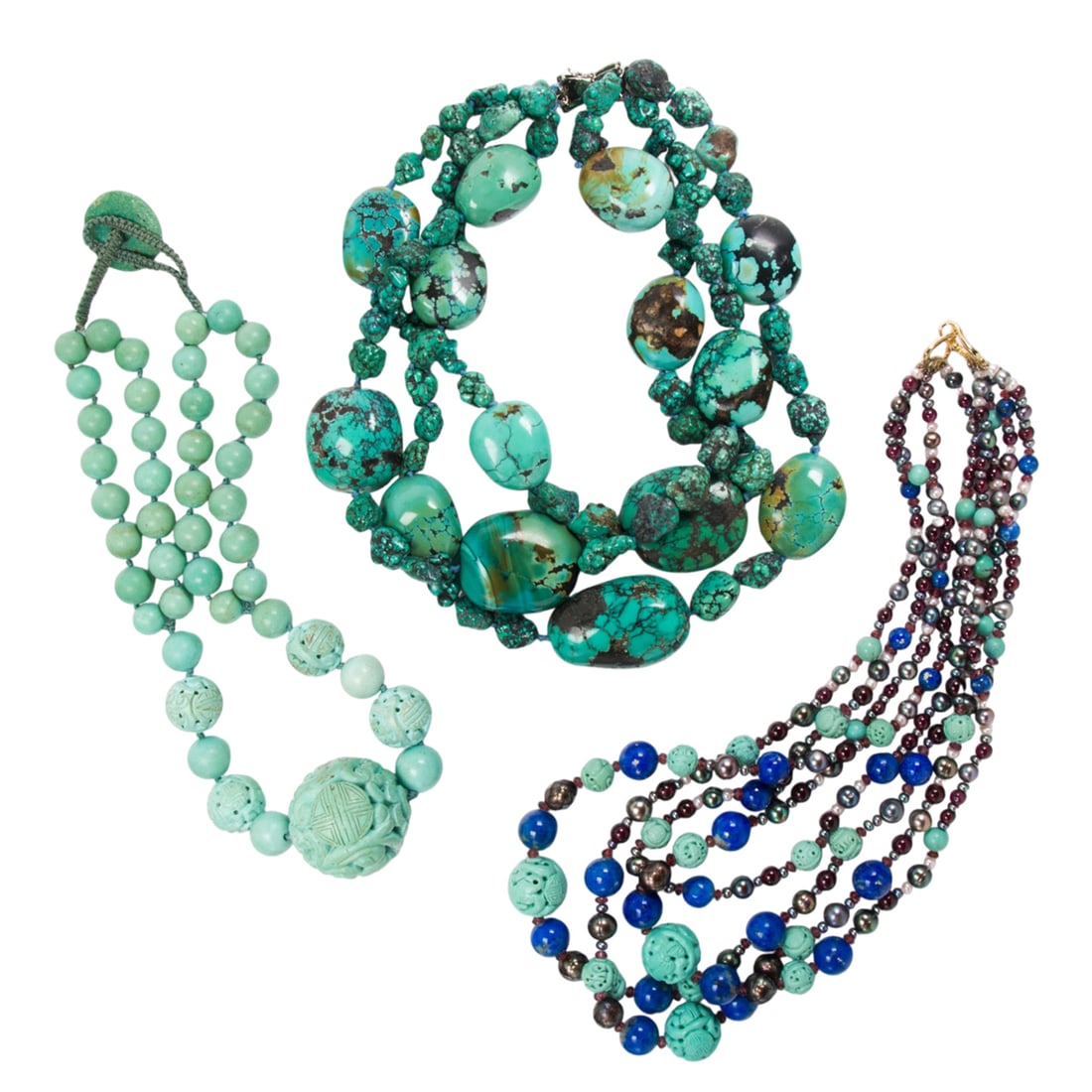 A group of hardstone necklaces: A group of hardstone necklaces Comprising three necklaces featuring lapis lazuli, turquoise, block turquoise, cultured pearl and amethyst; lengths: 14, 16 and 18 in
