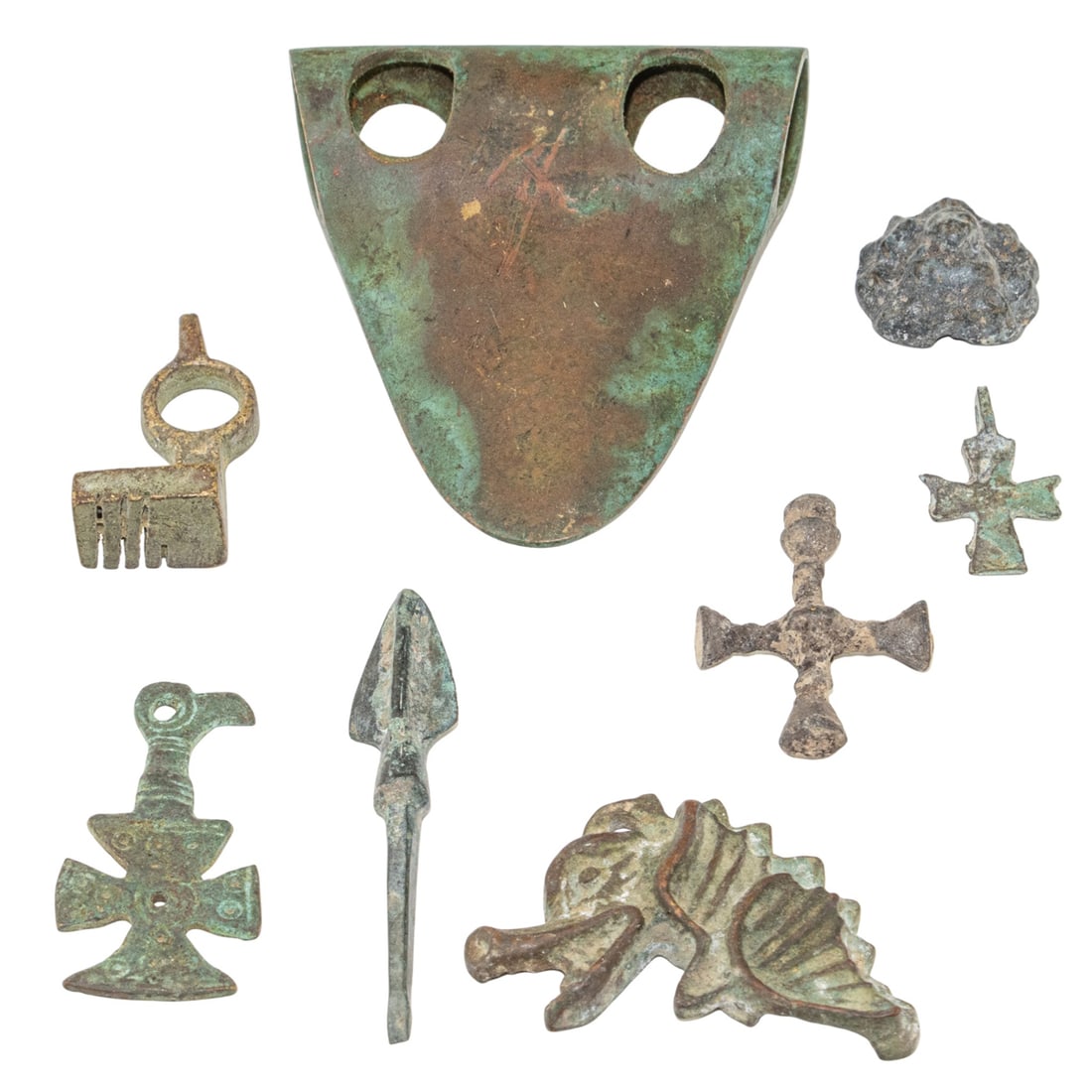 A group of ancient Roman and Roman era artifacts: A group of ancient Roman and Roman era artifacts, including duck shape axe head, Cypriot arrow head, amulets, key, cross pendants - c. 2 AD, various sizes