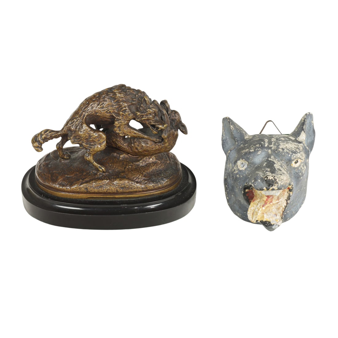 A Continental patinated bronze animalier group of a hound and wolf: A Continental patinated bronze animalier group of a hound and wolf, early 20th century, raised on marble plinth, 4.5"h x 5.25"l, together with painted plaster head of a wolf, 3.5"l [2 total]