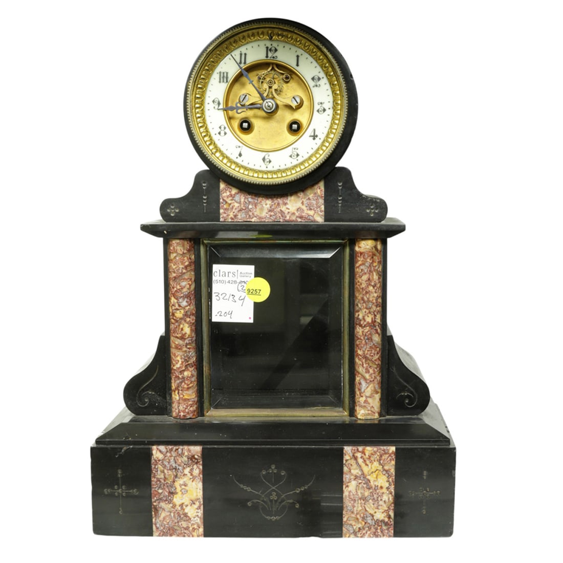 A French slate and marble mantel clock: A French slate and marble mantel clock, late 19th century, the dial with open escapement, time and strike movement sounding on a bell, housed within a drum raised on upright case with glass door and s