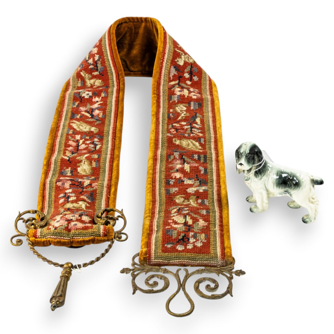 A Victorian style needlepoint bell pull and a pottery figure of a spaniel (1 of 2)