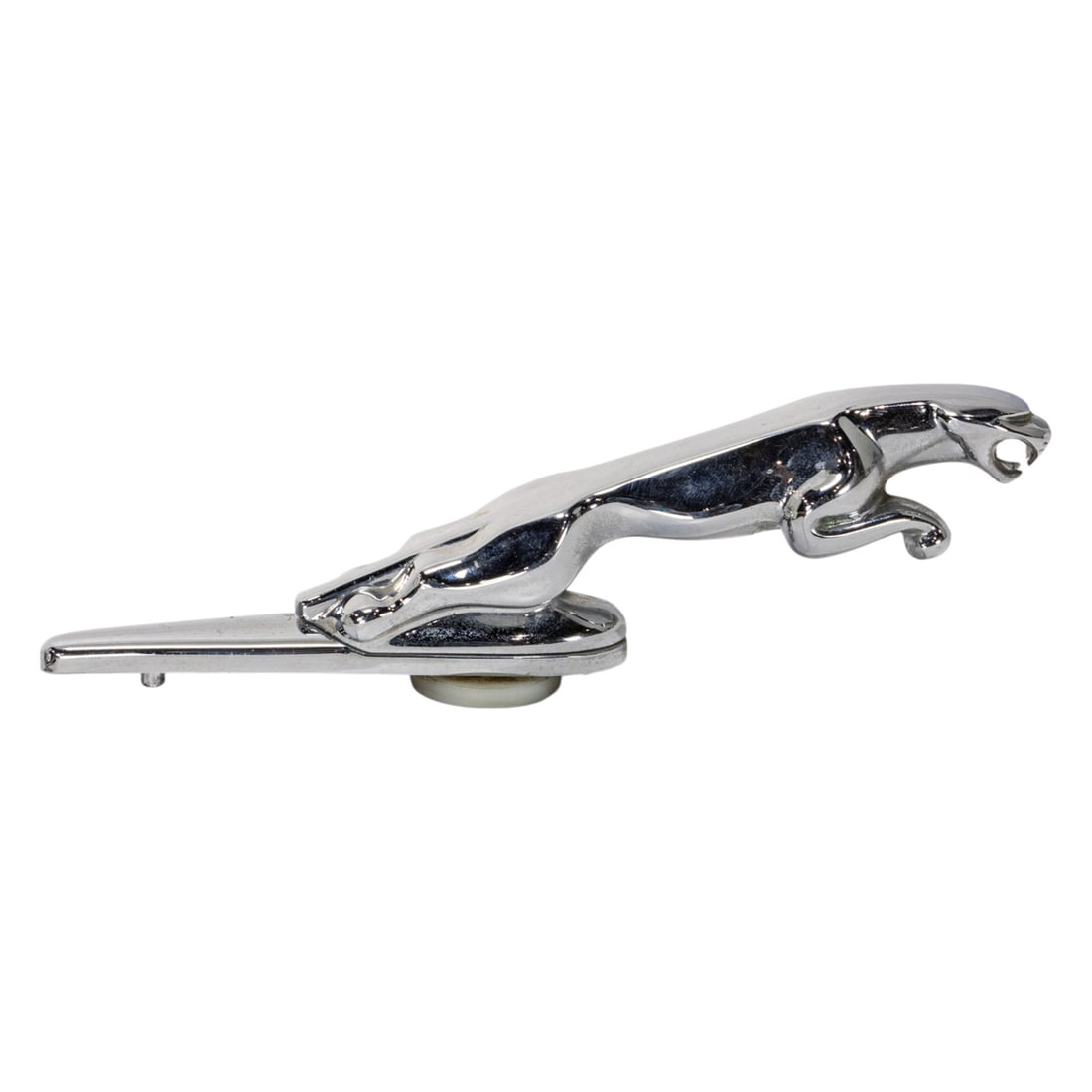 A chromed metal Jaguar hood ornament (1 of 4)