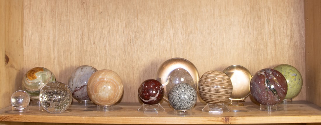 A collection of twelve stone and glass spheres (1 of 1)