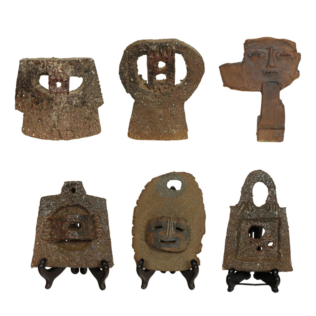 Sculptures, Richard Brennon: (lot of 6) Richard Brennon (American, 20th century), Mask and Totem Objects, ceramic, unsigned, overall (for largest): 5"h x 5"w x 1.75"d. Provenance: Property from the Private Collection of Viola