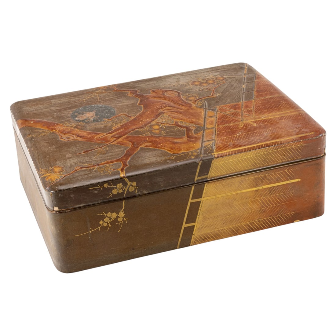 A Japanese lacquer box: A Japanese lacquer box. Depicting blossoming plum tree beneath a moon, Meiji period, 5.375"h x 16.5"w x 12.75"d.