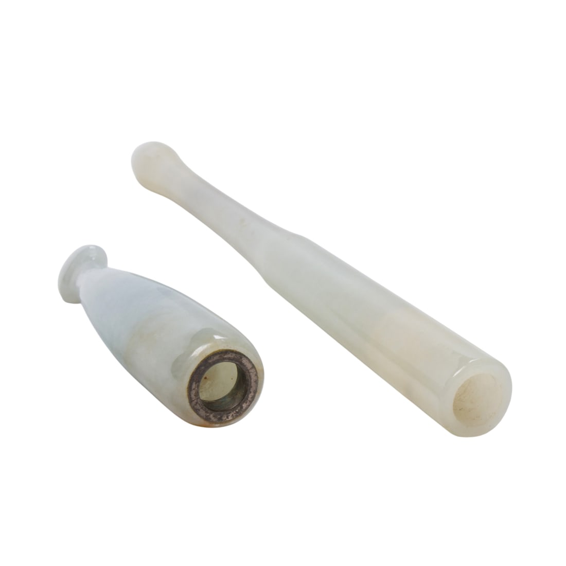 (lot of 2) Chinese jadeite cigarette holders: (lot of 2) Chinese jadeite cigarette holders. From 2.625" to 5.25" across.