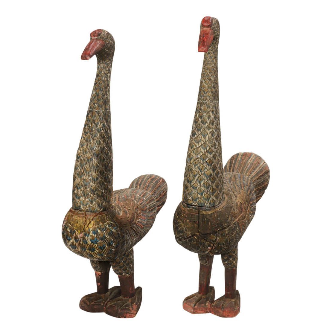 A pair of Indonesian painted wood goose statues