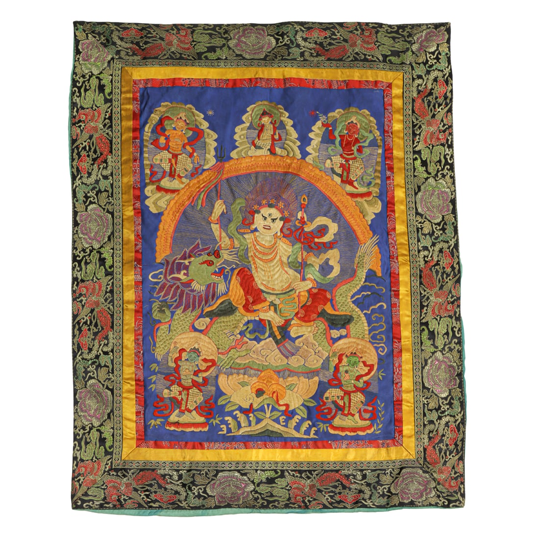 A Tibetan embroidered silk thangka