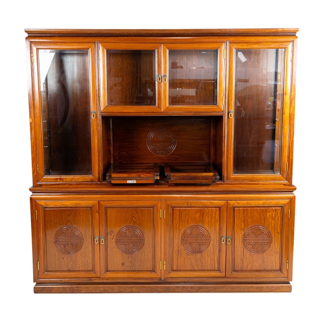 A Chinese style rosewood two-part display cabinet