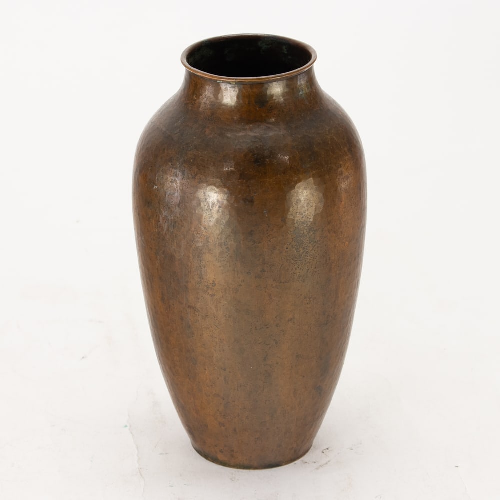 An Arts and Crafts hammered copper vase (1 of 3)