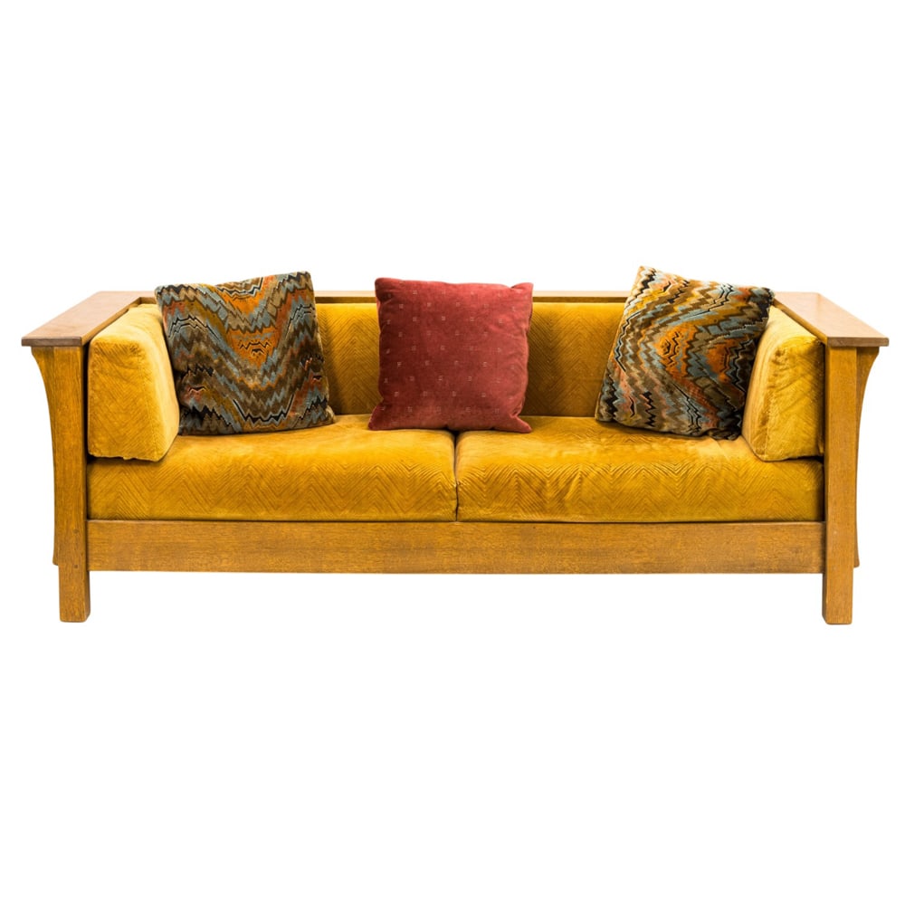 An Arts and Crafts style Prairie settle: An Arts and Crafts style Prairie settle, after L and J.G Stickley model 220, with two seat cushions and paneled sides, 28.5"h x 84"w x 37"d