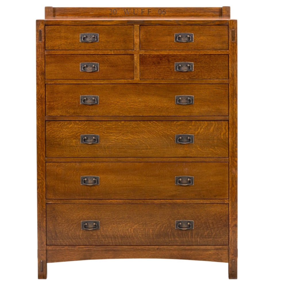 An Arts and Crafts style Stickley Audi tall chest: An Arts and Crafts style Stickley Audi tall chest, with thru tenon construction, and carved 20 WUFF 06, 54.5"h x 40"w x 20"d