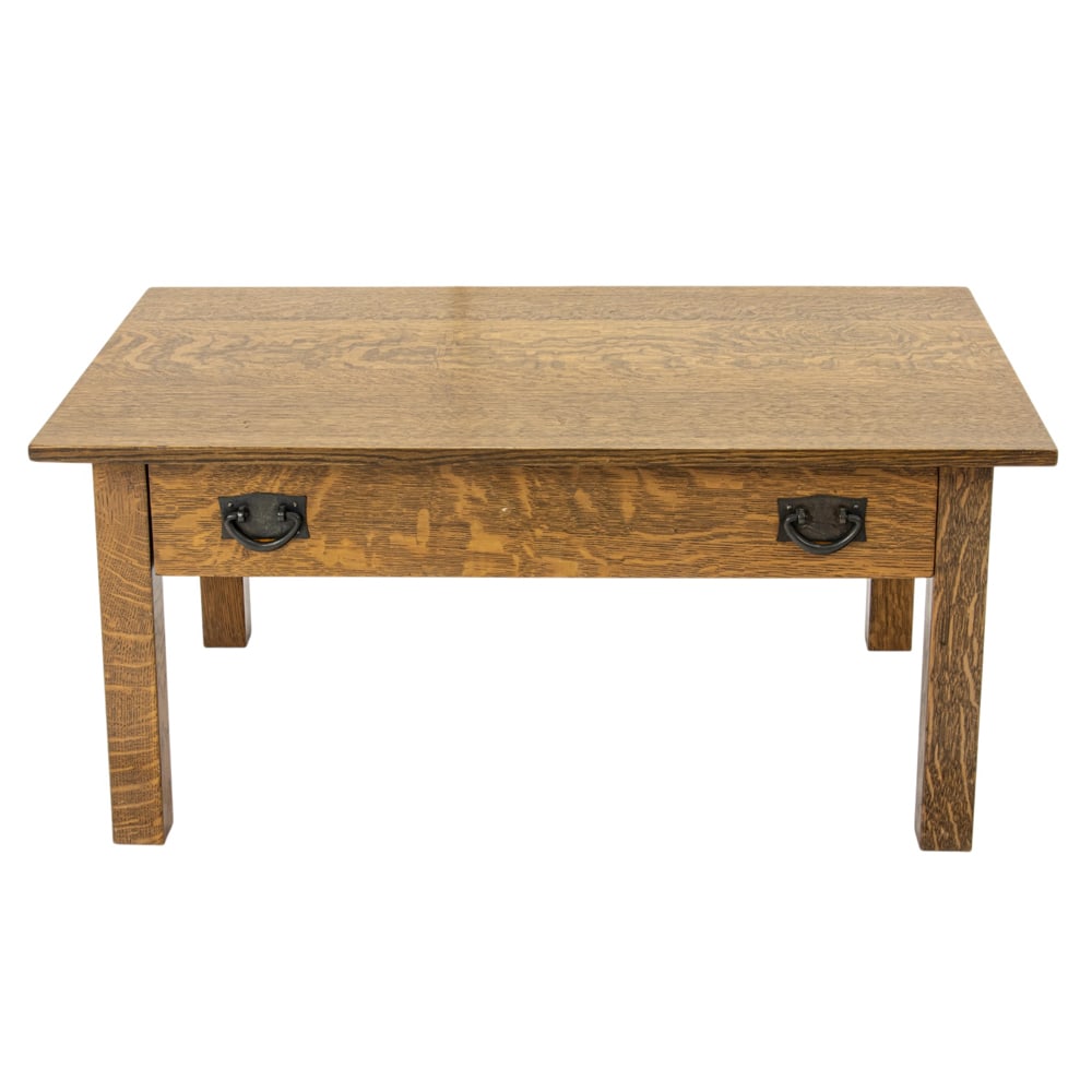 An Arts and Crafts reduced writing desk: An Arts and Crafts reduced writing desk, Lifetime Furniture Grand Rapids, with a single drawer retaining original hardware and now fashioned as a coffee table, 16"h x 36"w x 24"d