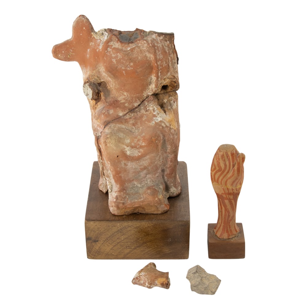 Two antiquity pottery fragments: Two antiquity pottery fragments, consisting of a Greek terra cotta figure of a seated woman, and a Mycenaean style figure, likely of the Phi, greatest 6.25"h x 4"w
