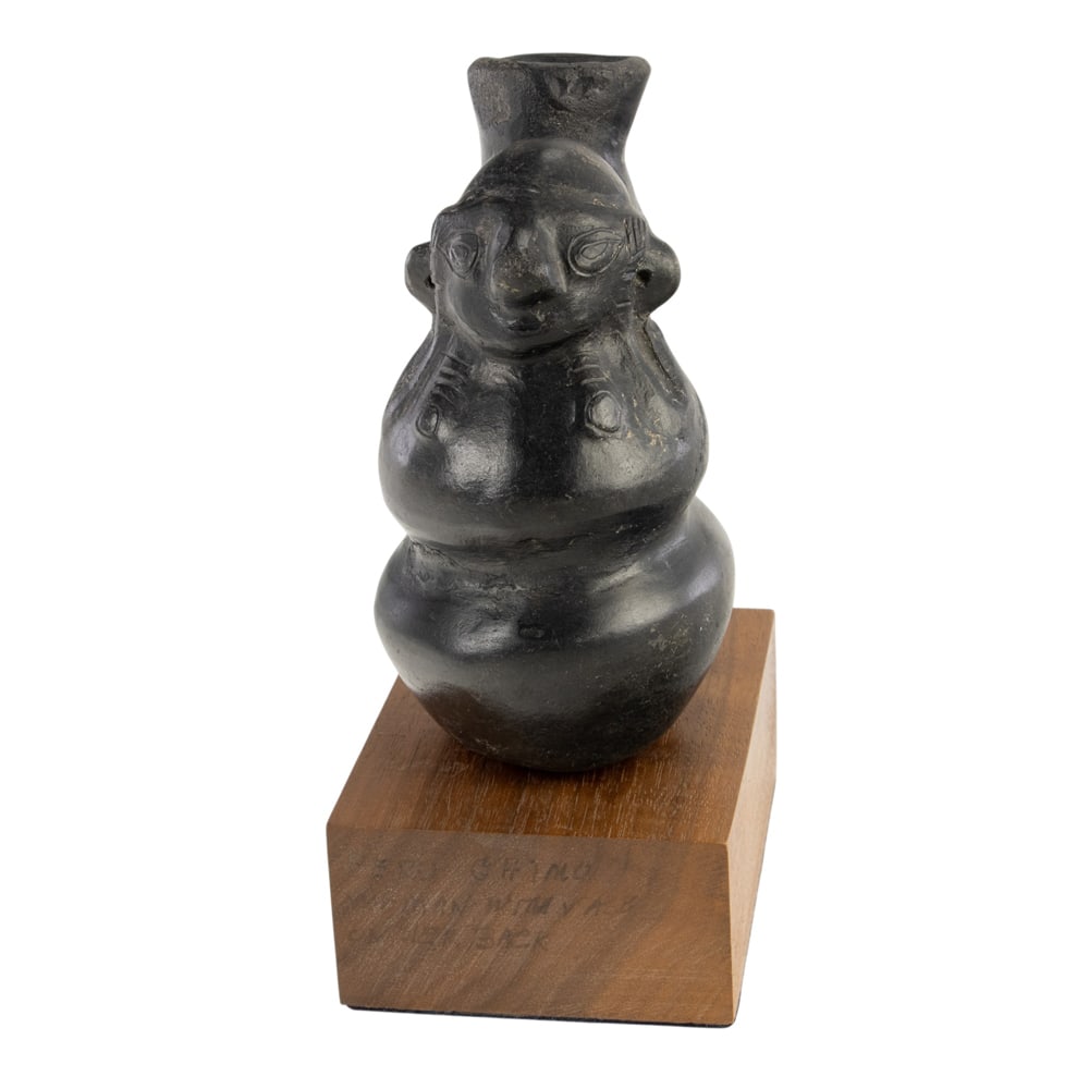 A Pre Columbian style blackware vessel: A Pre Columbian style blackware vessel, 4.5"h x 3"w