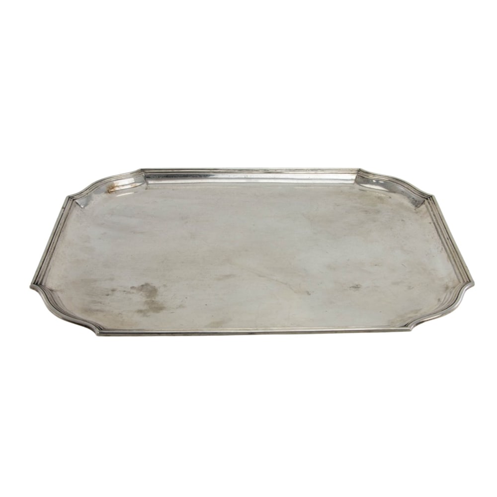 A German 800 standard silver shaped rectangular tray with presentation inscription: A German 800 standard silver shaped rectangular tray with presentation inscription on verso dated 1921, L 17 1/2 in x W 14 1/2 in. (48.70 oz t.)