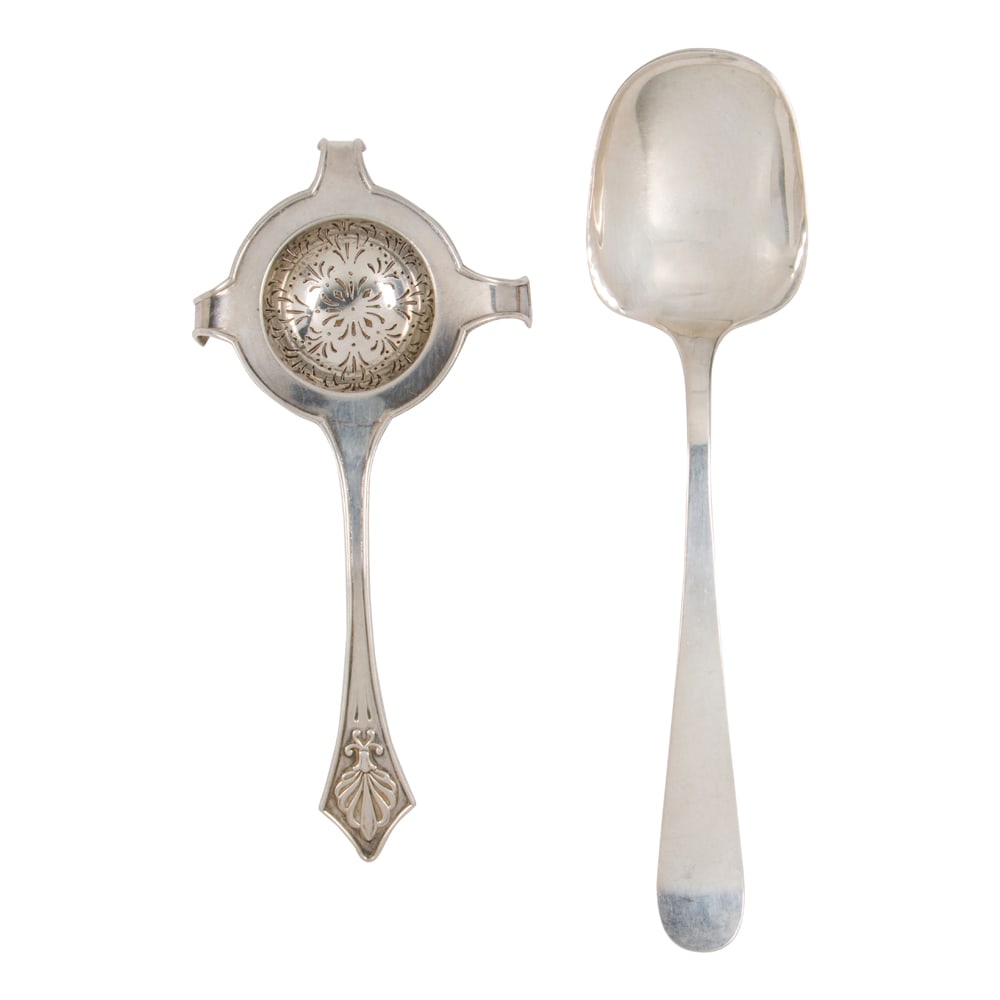 A sterling handwrought large serving spoon, Kalo: A sterling handwrought large serving spoon, Kalo, L. 9 3/4 in; together with a large tea strainer, retailed by Marshall Field & Co. monogrammed on verso, with repair, L. 8 in. (6.37 oz t.)