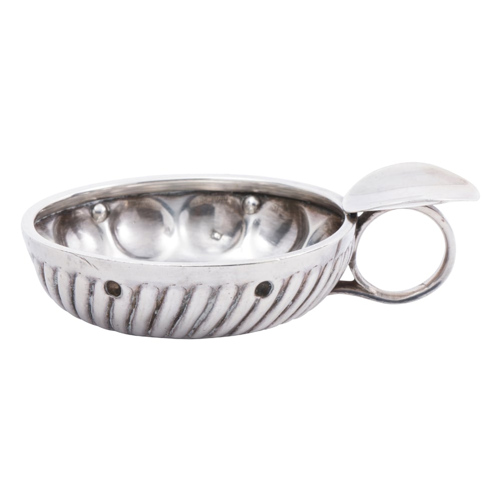 A French 950 standard silver tastevin, Massat Freres: A French 950 standard silver tastevin, Massat Freres, Paris, late 19th/early 20th century, traditional form, L. 4 in. (2.26 oz t.)