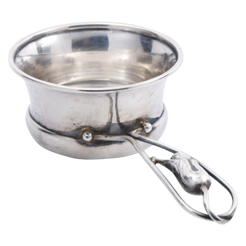 A Canadian handwrought sterling cup with handle in the Jensen taste, Carl Poul Petersen: A Canadian handwrought sterling cup with handle in the Jensen taste, Carl Poul Petersen, Montreal, circa 1930-1979, L. 5 1/2 in. (1.55 oz t.)