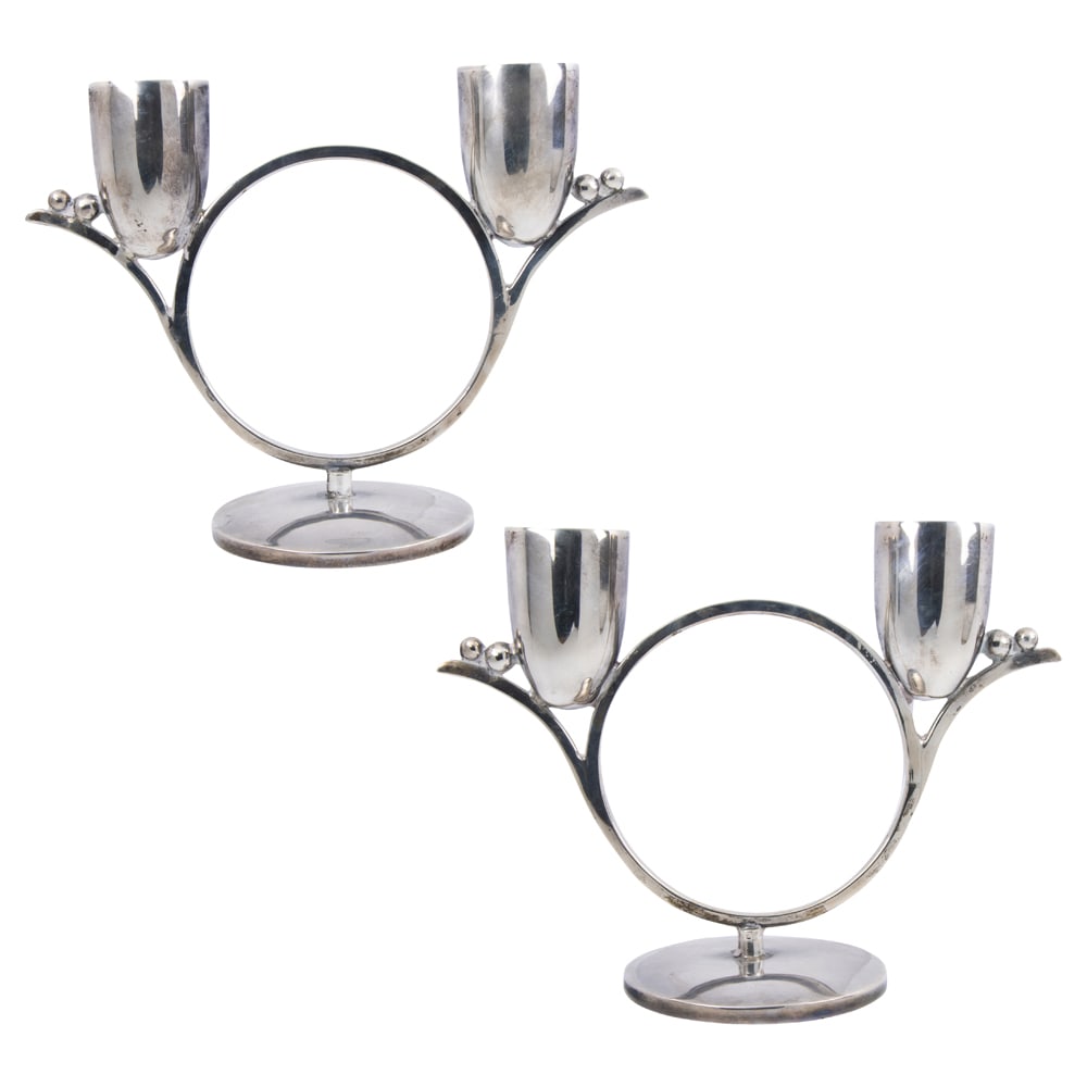 A Mexican sterling pair of two light candelabra, marked: CLS: A Mexican sterling pair of two light candelabra, marked: CLS, H. 6 1/2 in. (25.74 oz t) Provenance: Property of a Presidio Heights collection, San Francisco