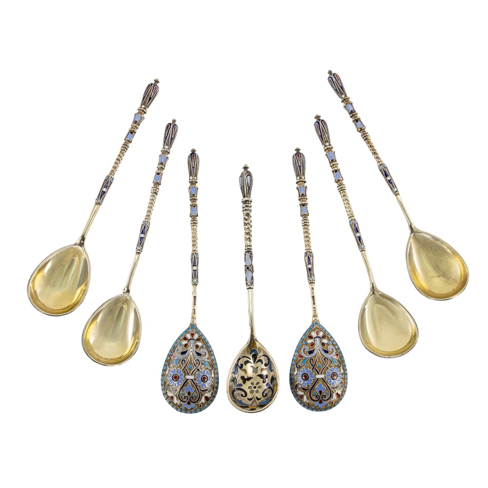 A Russian 84 standard silver-gilt and enamel set of six teaspoons: A Russian 84 standard silver-gilt and enamel set of six teaspoons, Gustav Klingert, Moscow, late 19th-early 20th century, together with a plique a jour example by the same maker, dated 1890. [7 total]