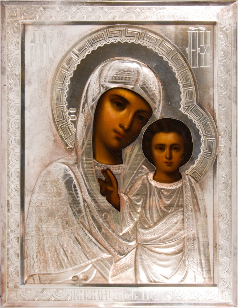 A Russian Kazan icon of the Mother of God with 84 standard silver oklad: A Russian Kazan icon of the Mother of God with 84 standard silver oklad, circa 1899-1908, H. 8 3/4 in x 6 7/8 in.