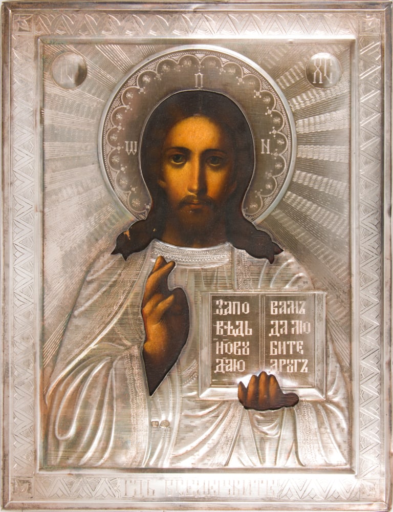 A Russian icon of the Savior Almighty with 84 standard silver oklad: A Russian icon of the Savior Almighty with 84 standard silver oklad, circa 1899-1908, H. 9 in x W. 6 3/4 in.