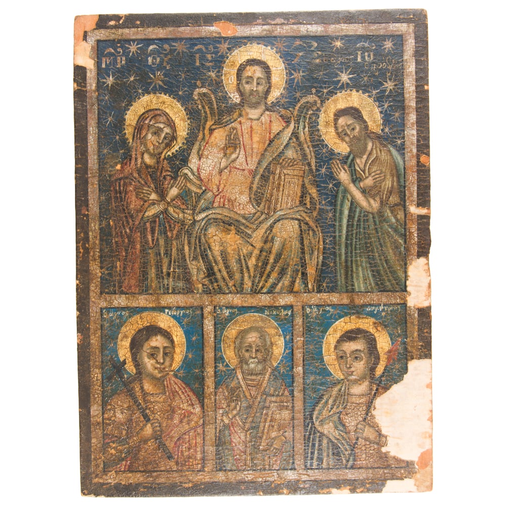A Russian icon: A Russian icon, 19th century, depicting Christ Pantokrator flanked by Virgin Mary and St. John the Baptist, above lower register with three martyr or saints, 13"h x 9.5"w