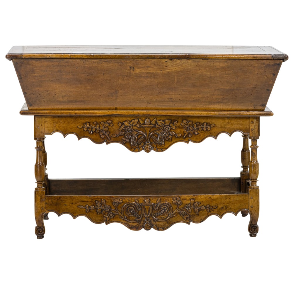 A French chest on stand, early 19th century: A French chest on stand early 19th century, with a carved floral and scroll base, 35"h x 51.5"w x 22"d