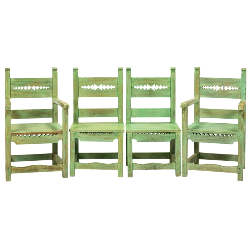A set of four Mexican paint decorated side chairs: A set of four Mexican paint decorated side chairs, 37.5"h x 19.5"w x 18"d (overall); 17.5"w x 16.5"d (seat)