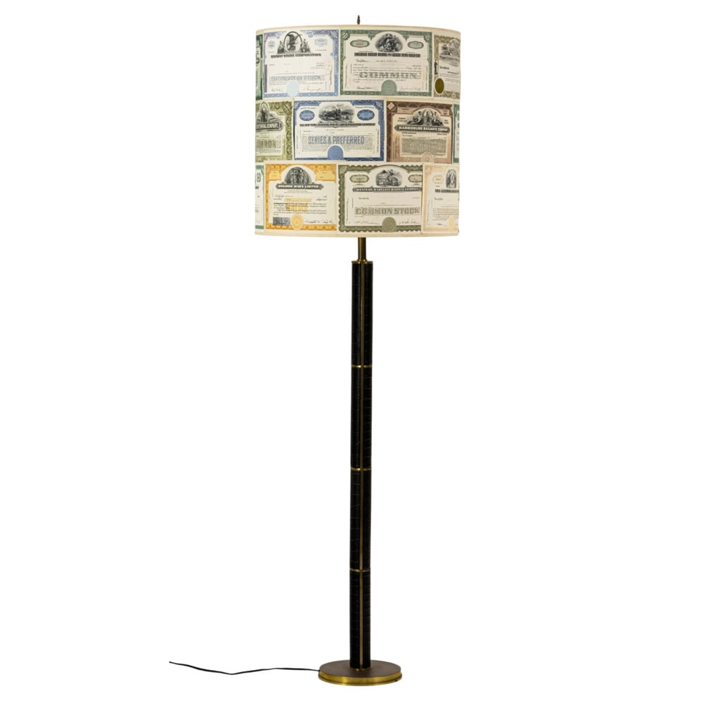 A leather clad floor lamp with custom stock certificate shade: A leather clad floor lamp with custom stock certificate shade, 77"h x 24"dia (shade). Provenance: A private collection, Russian Hill, San Francisco, from the storied Gold Coast residence known as