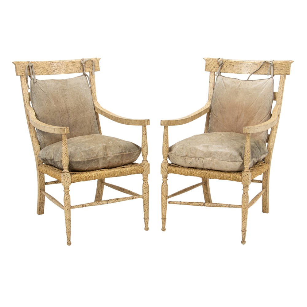 A pair of Rose Tarlow Melrose House 'Tumbleweed' armchairs: A pair of Rose Tarlow Melrose House 'Tumbleweed' armchairs, each ladder back lounge chair painted with animals with rush seat with later leather cushions, , 39.5"h x 22"w x 35"d (overall); 25"h x