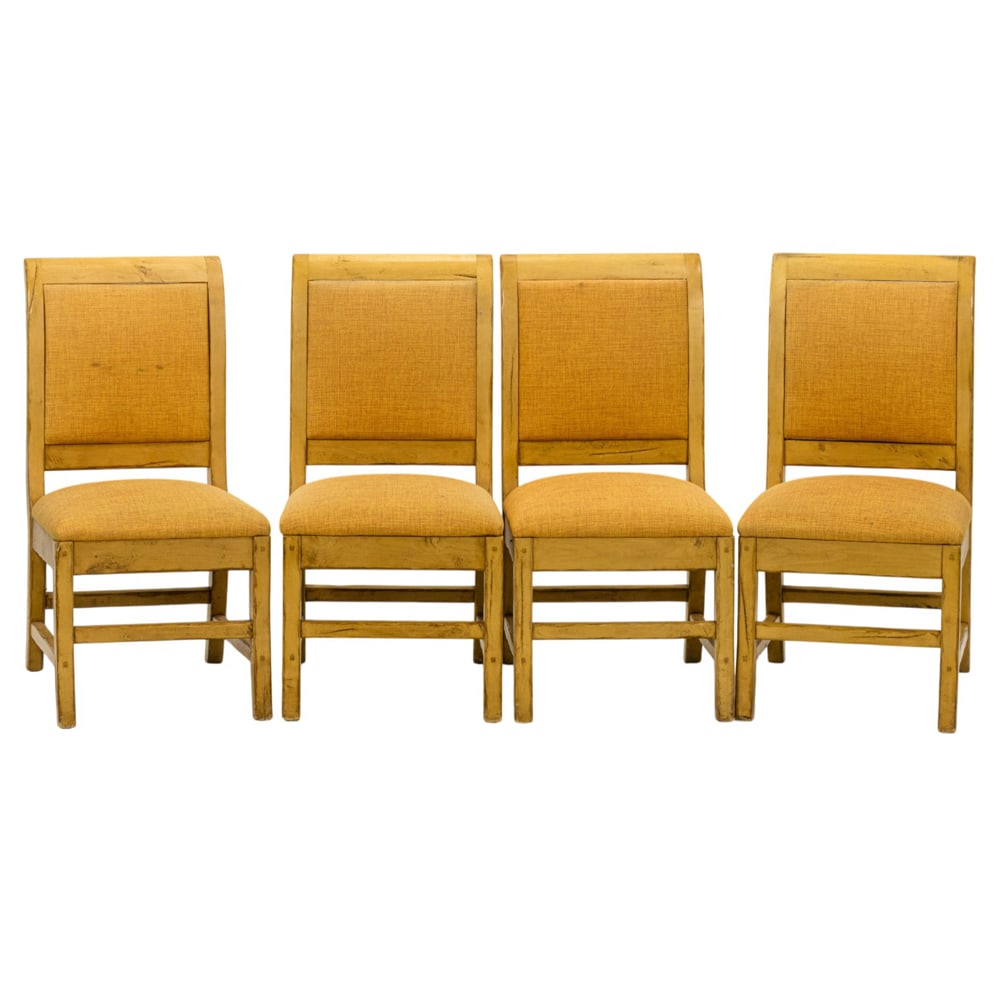 A set of four upholstered dining side chairs: A set of four upholstered dining side chairs, with sway backs and blonde frame, 39"h x 19"w x 23.5"d (overall); 20"h x 19"d (seat). Provenance: A private collection, Russian Hill, San Francisco, from