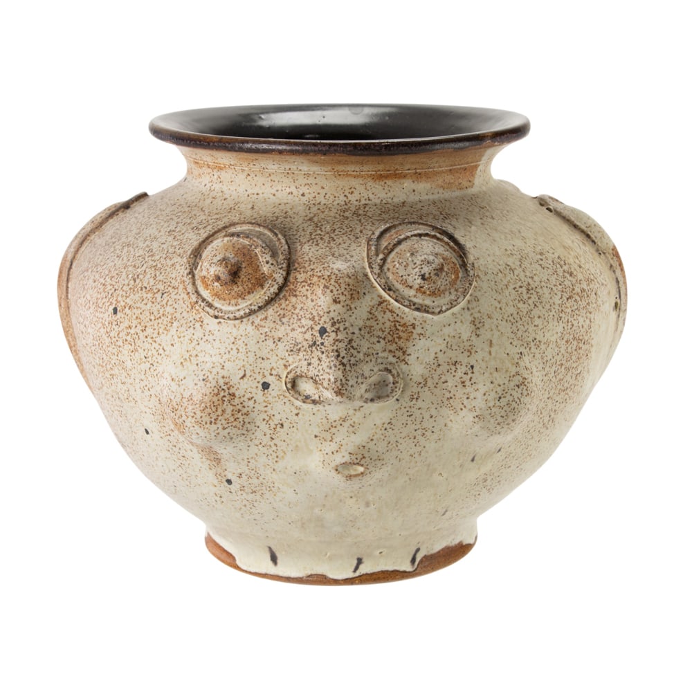 A Studio glazed stoneware face vase: A Studio glazed stoneware face vase, indistinctly signed and dated '67, 6.25"h x 8.5"dia