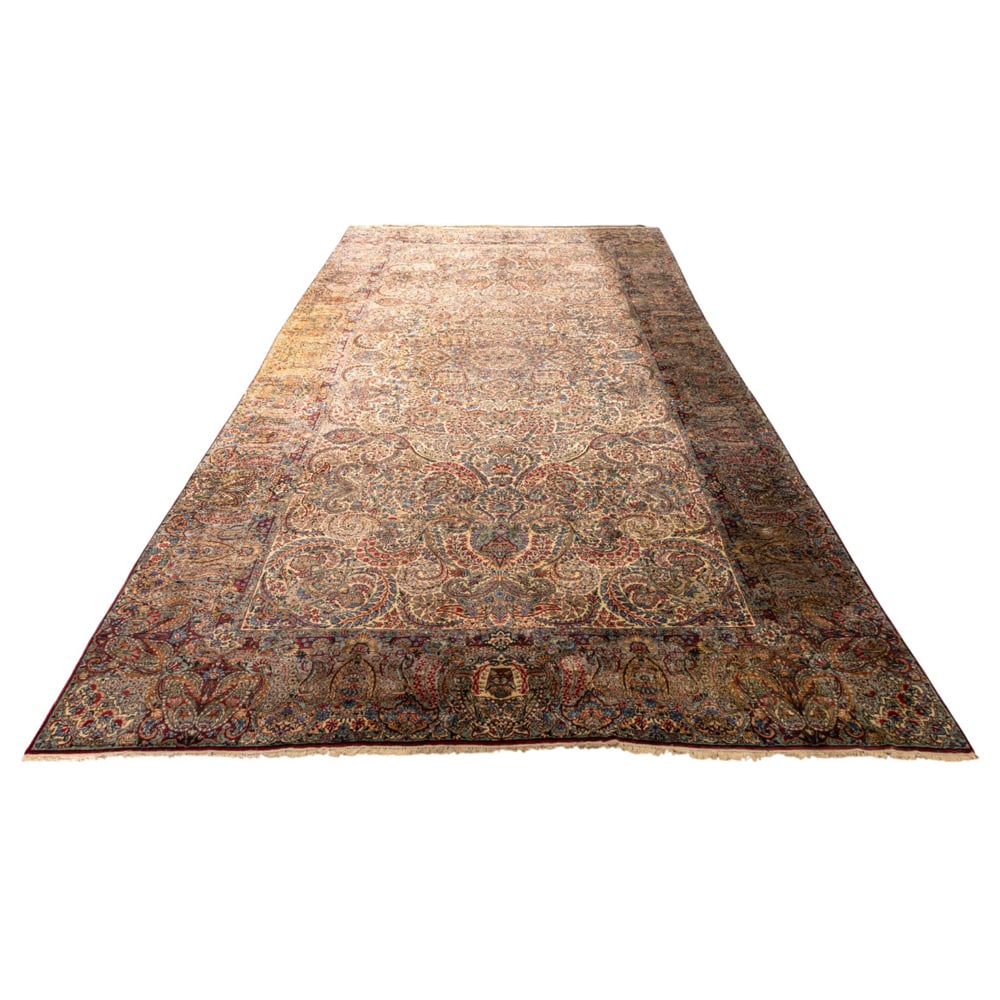 An antique Persian Lavar Kerman carpet: An antique Persian Lavar Kerman carpet, 24' x 11'10"