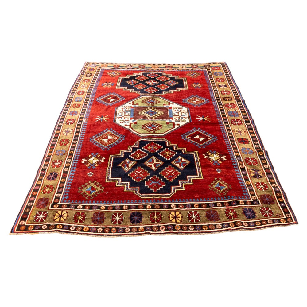 An Afghan carpet: An Afghan carpet, 9'12" x 6'6"