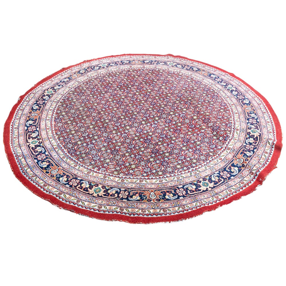 A Persian Tabriz circular carpet: A Persian Tabriz circular carpet, 8'3"