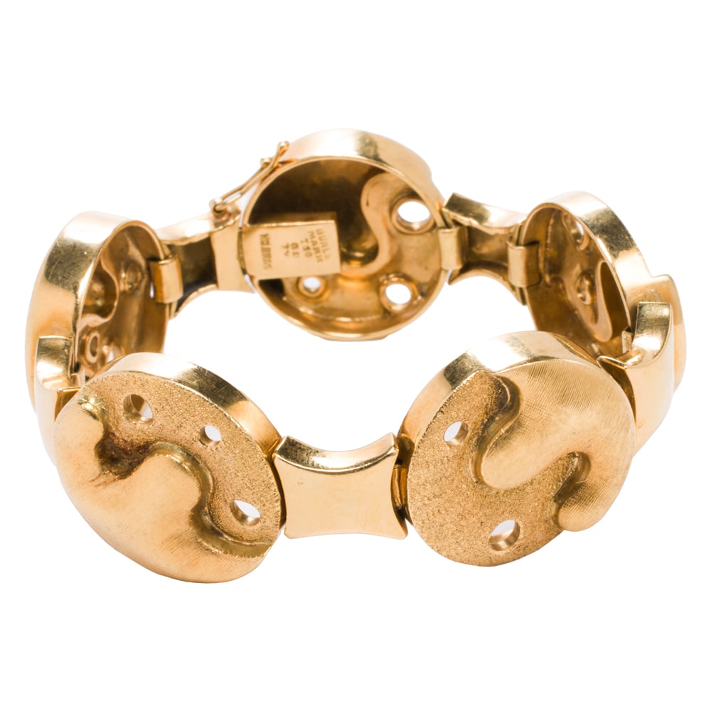 A vintage Burle Marx 18k gold bracelet: A vintage Burle Marx 18k gold bracelet Of abstract modernist design, featuring textured segments; length: 6 1/4 in; 55.90 grams