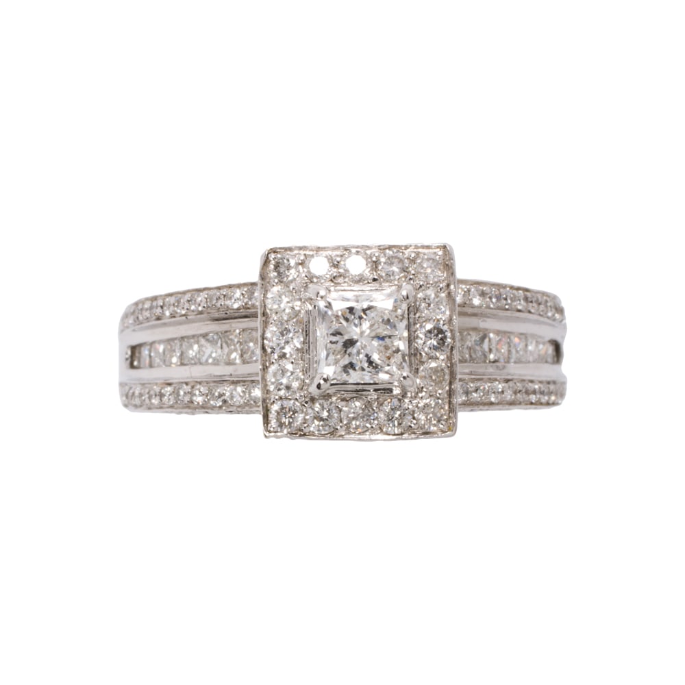 A diamond and 14k white gold ring: A diamond and 14k white gold ring Centering a princess-cut diamond weighing approximately 0.40 carat, with round brilliant-cut and square-cut diamond surround, bridge, and shoulders; estimated total d
