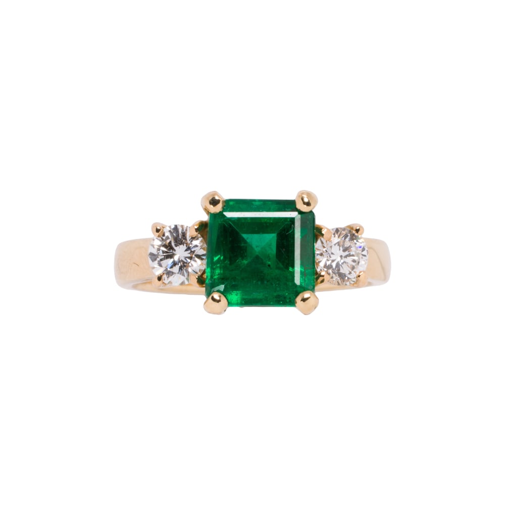 An emerald, diamond, and 18k gold ring (1 of 2)