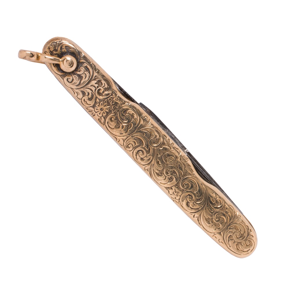 A 14k gold and stainless steel pocket knife (1 of 2)