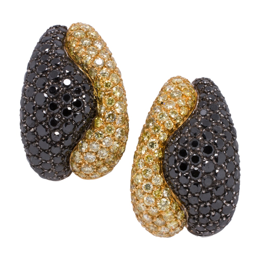 A pair of RCM diamond and 18k gold convertible earrings: A pair of RCM diamond and 18k gold convertible earrings The convertible earrings to ear-clips set with round brilliant-cut black and yellow diamonds weighing a total of approximately 4.40 carats;