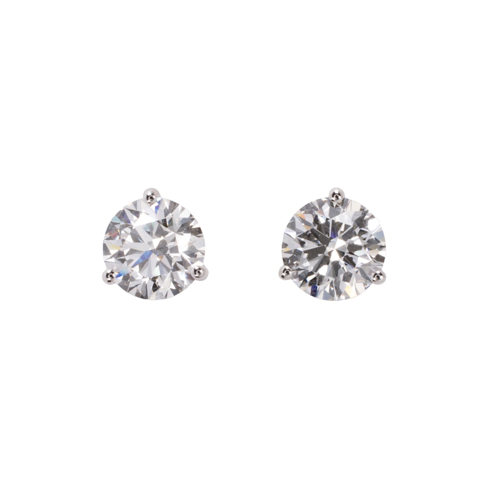A pair of lab-grown diamond and 14k white gold solitaire earrings: A pair of lab-grown diamond and 14k white gold solitaire earrings The earrings set with lab-grown diamonds weighing 1.57 carats each; 2.40 grams Accompanied by IGI report no.: LG792651129 5/25/2026 st