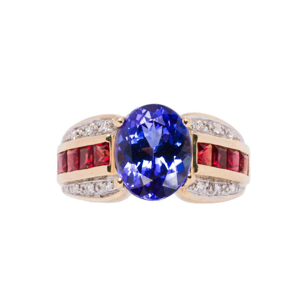 A tanzanite, ruby, diamond, and 14k gold ring: A tanzanite, ruby, diamond, and 14k gold ring Centering an oval-cut tanzanite measuring 10.21 x 8.10 x 5.99 mm, framed on either side by channels of square-cut rubies and round brilliant-cut diamonds;