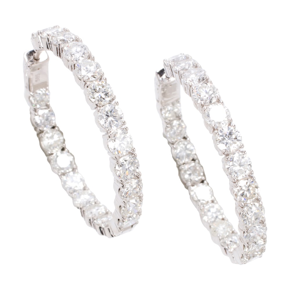 A pair of diamond and 14k white gold hoop earrings (1 of 1)