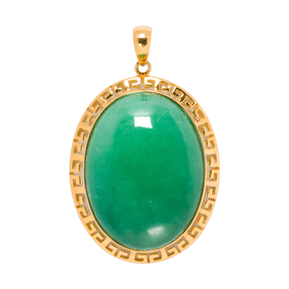 A jade and 14k gold pendant: A jade and 14k gold pendant Centering an oval shaped jade cabochon measuring 24.17 x 17.23 x 7.18 mm, within 14k gold setting; length: 1 1/2 in; 7.90 grams