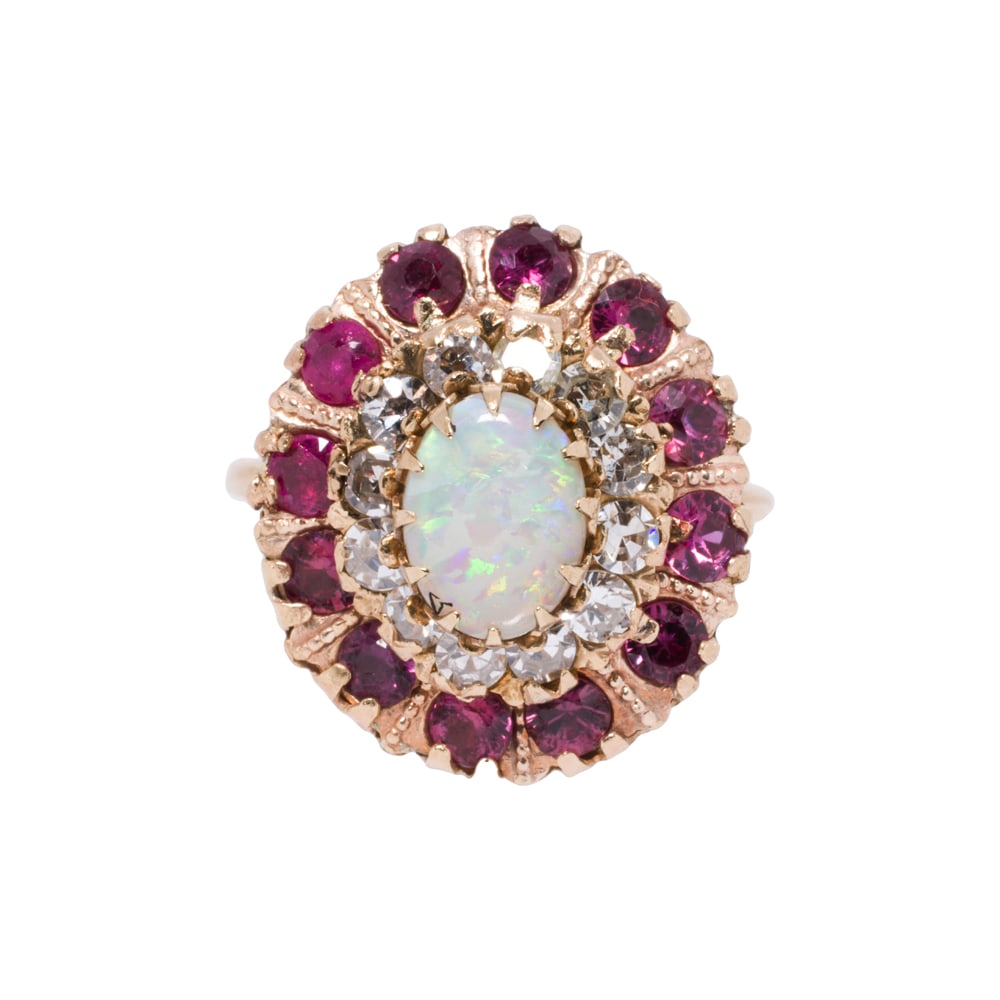 An opal, diamond, ruby and gold ring (1 of 2)